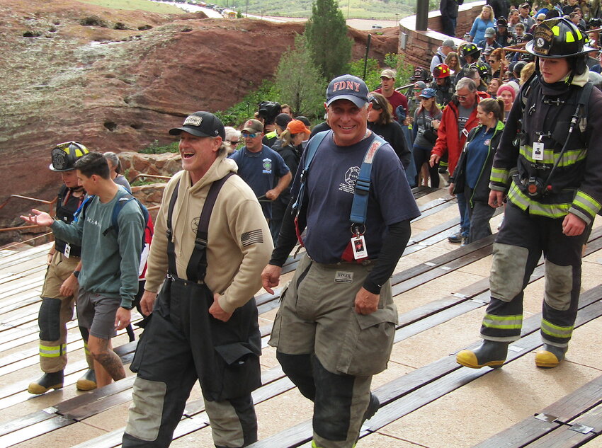 Joe Sapia, wearing an FDNY cap, walks in the 9/11 Memorial Stair Climb at Red Rocks Amphitheatre. Sapia was a Long Island firefighter on Sept. 11, 2001, and he arrived at the scene of the Twin Towers just before the North Tower collapsed.